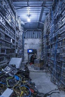 A sprawling cryptocurrency mining farm operating under strict maintenance protocols